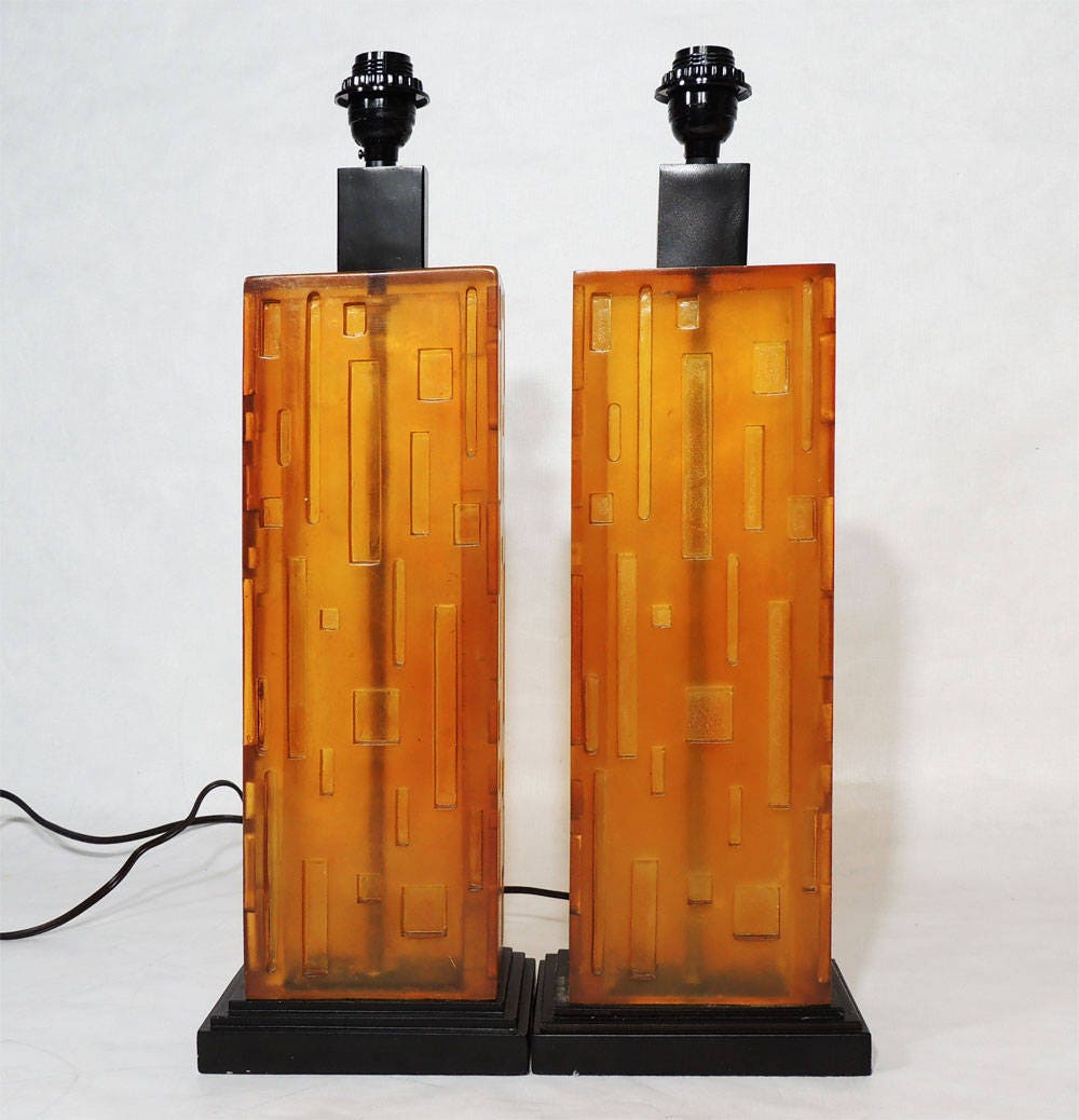 Two Modernist style Geometrical Cityscape Transparent Lucite Orange Table Lamps