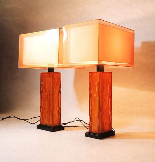 Two Modernist style Geometrical Cityscape Transparent Lucite Orange Table Lamps