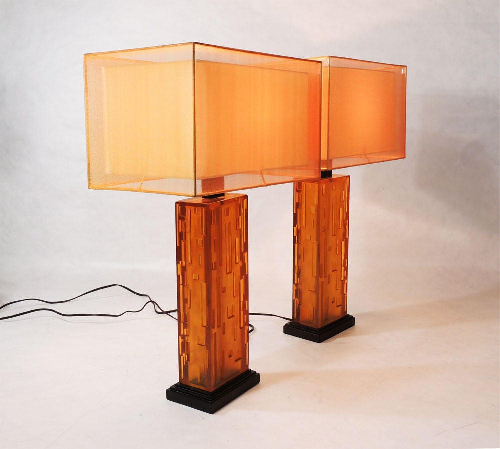 Two Modernist style Geometrical Cityscape Transparent Lucite Orange Table Lamps